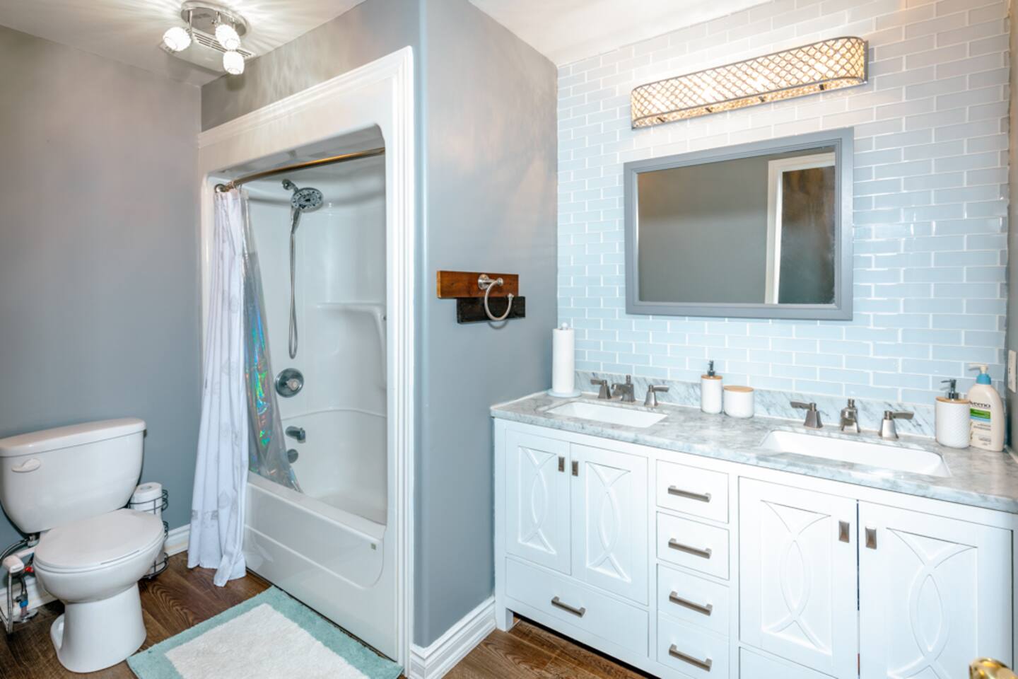 Bathroom with double vanity and tub-shower