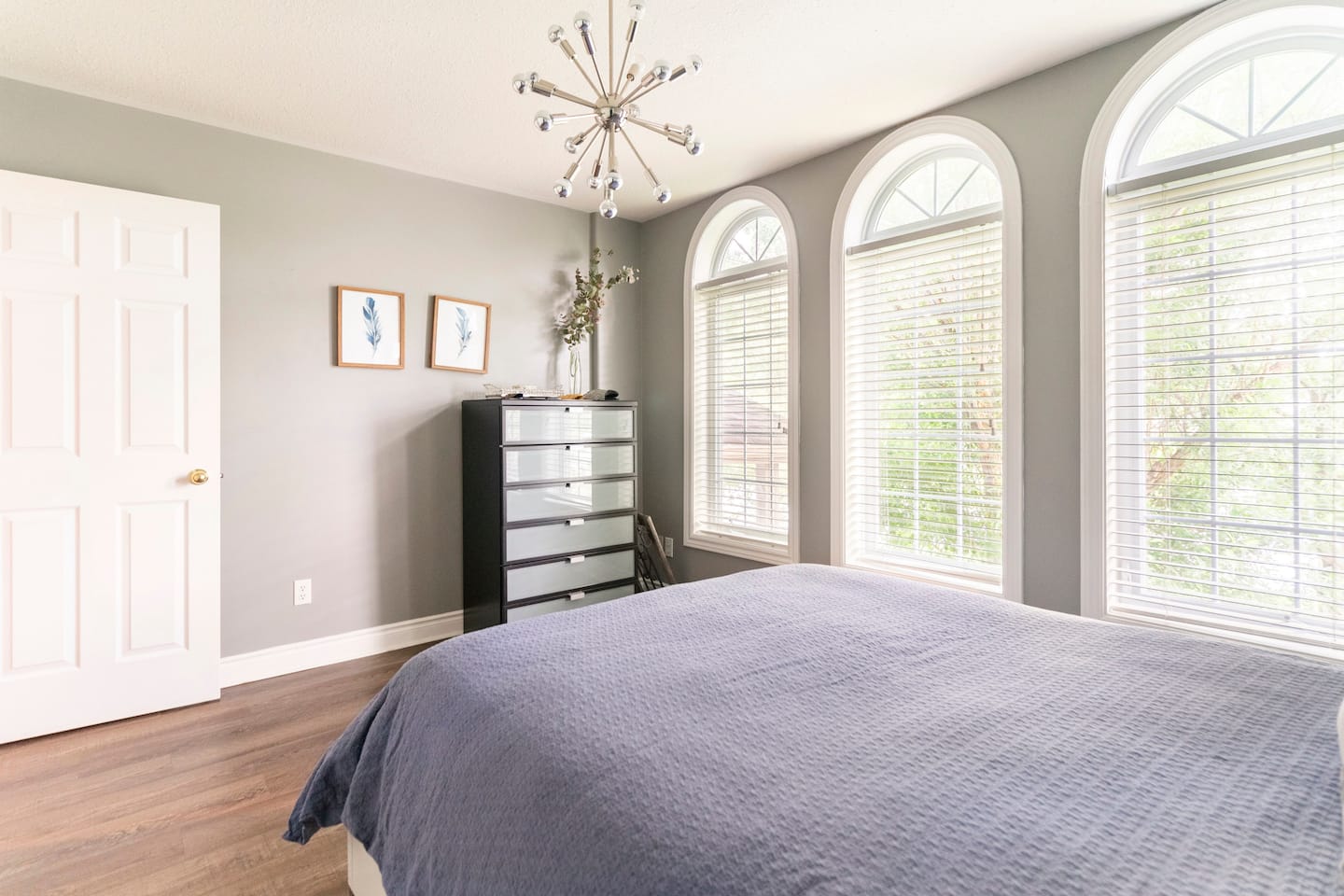 Queen bedroom with arched windows