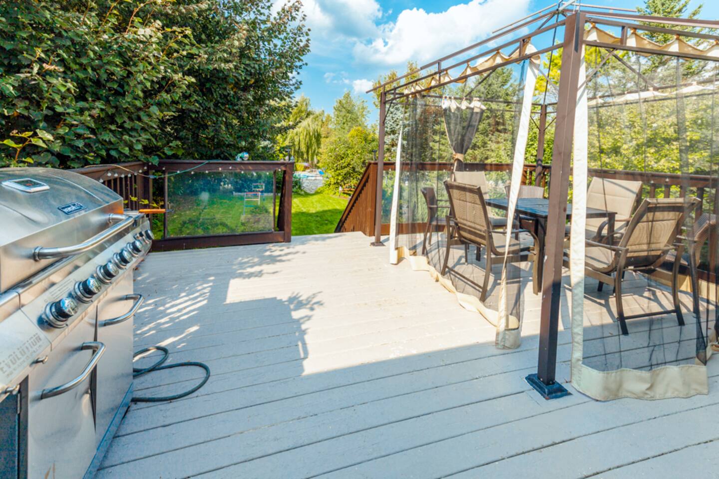 Deck with BBQ and covered dining