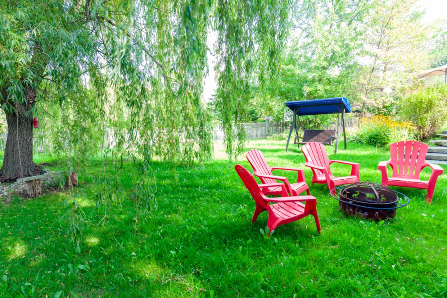Fire pit with Muskoka chairs