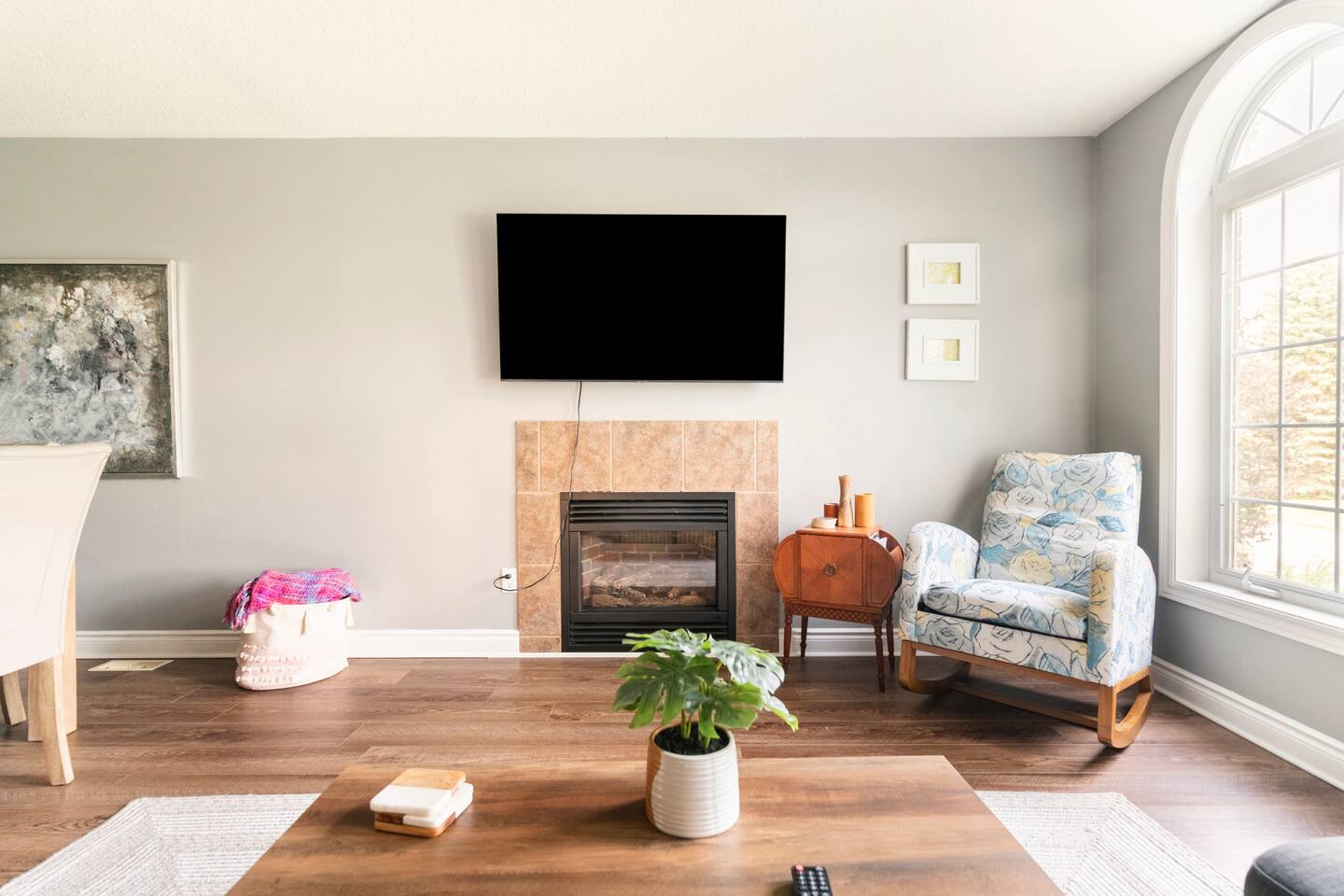 Second living area with fireplace and TV